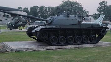 Army equipment using in war are placed in public park for kids in Lahore, Pakistan on May 15, 2024. photo