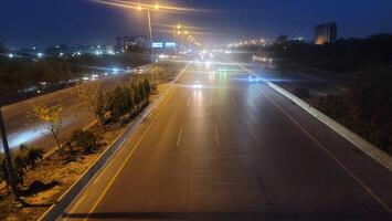 High angle night view of ring road passing around the capital city of Punjab in Lahore, Pakistan on May 15, 2024. photo