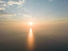 Golden Horizon, Capturing the Beauty of Sea at Sunset in Xiaoliuqiu, Taiwan photo