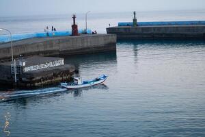 Harbor Xiaoliuqiu, Peaceful Sea Views and Fishing Ships in Taiwan photo