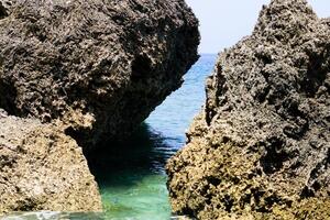 Coastal Sea Rock Reefs, Beautiful Seaside Scenery in Liuqiu Island, Taiwan photo