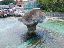 Coastal Drone Captured Seascapes with Giant Vase Shaped Rock in Taiwan Island photo