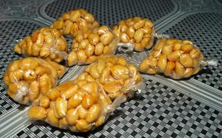 Fried peanuts on the table photo