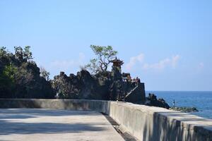 View of a Hindu temple on the beach photo