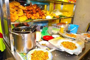 Fried noodles with curry sauce are ready to be served photo