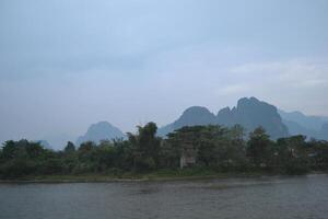 View of karst hills and Nam song river in the morning photo