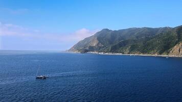 Avalon City on Santa Catalina Island. Scenic seascape and mountains photo