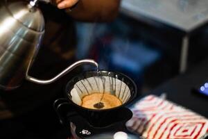 Midsection of Barista making Coffee Beverages photo