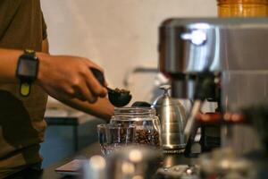 Midsection of Barista making Coffee Beverages photo