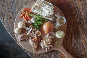 Cooking ingredients on a wooden tray photo