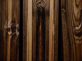 un detallado textura de oscuro natural madera foto