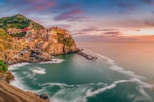 Manarola village at sunset, Cinque Terre National Park, Italy. photo