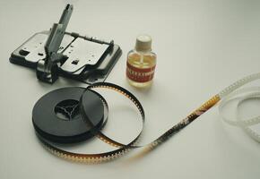 Vintage 8mm moviola cutter with 8mm reel and glue. photo