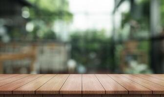 Empty wooden table top with lights bokeh on blur restaurant background photo