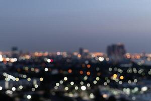 Blurred night city skyline background photo