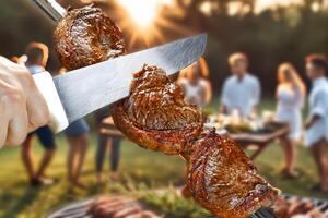 Steak rotisserie at the steakhouse, sliced picanha, Picanha photo