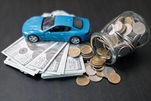 Business concept involved using finance calculator to determine premium for vehicle policy, ensuring clear financial contract for car. Investing in auto insurance can save money on transport costs. photo