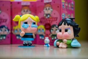 Bangkok, Thailand - May 4, 2024 CRYBABY x Powerpuff Girls Series Figures in pink box from Pop mart shop. Collection from Pop Mart blind box collectable cute toys design photo