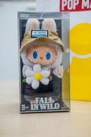 Bangkok, Thailand - May 4, 2024 POP MART The Monsters LABUBU Fall in Wild Vinyl Plush Doll photo