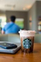 Samut Prakan, Thailand - May 21, 2024 A glass of Starbucks coffee, Cold foam iced espresso photo