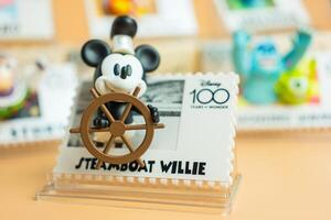 Bangkok, Thailand - May 4, 2024 Steamboat willie, Figure of MINISO Disney 100 Years of Wonder Retro Stamp Series Blind Box Figure photo