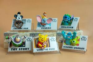 Bangkok, Thailand - May 4, 2024 Figure of MINISO Disney 100 Years of Wonder Retro Stamp Series Blind Box Figure. photo