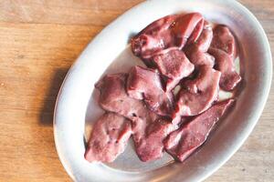 Pieces of raw pork liver photo