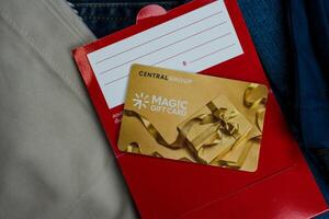 Bangkok, Thailand - May 29, 2024 A Central magic gift card. Central is a big shopping mall in Thailand photo