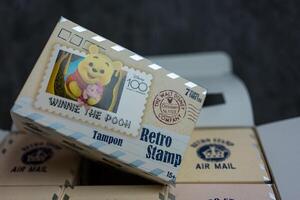 Bangkok, Thailand - May 1, 2024 A box toy Figure of MINISO Disney 100 Years of Wonder Retro Stamp Series photo