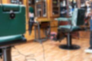 Blur background of cozy barbershop or hairdressing salon. photo