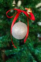 Christmas decoration silver balls on a branch photo