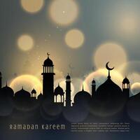 ramadan kareem islamic seasonal greeting with bokeh effect vector