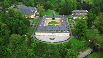 Aerial descending view of chateau Kozel in Czechia video