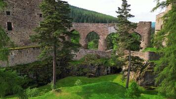 Aerial fly through window of castle Velhartice in Czechia video