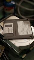 old computer floppy disk and motherboard video