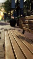 Park bench in downtown on a cloudy afternoon video