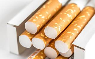 Cigarettes inside the pack. Concept of smoking and harm to health. Close-up photo