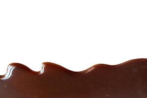 Liquid Chocolate Cream isolated on white background with clipping path photo