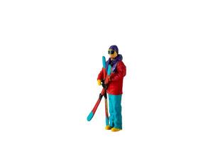 Miniature people , A skier full length Isolated with clipping path photo