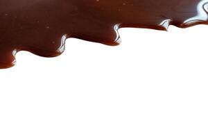 Liquid Chocolate Cream isolated on white background with clipping path photo