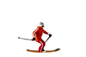 Miniature people , A skier full length Isolated with clipping path photo