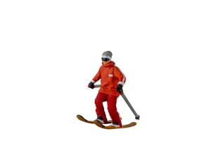 Miniature people , A skier full length Isolated with clipping path photo