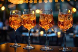 A refreshing glass of iced tea with a slice of orange photo