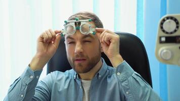 A handsome male patient wearing special ophthalmic glasses video