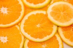 Sliced freshness orange fruit background. Round Pattern. photo