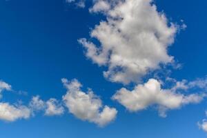 blue sky with clouds and sun reflection.The sun shines bright in the daytime in summer 2 photo