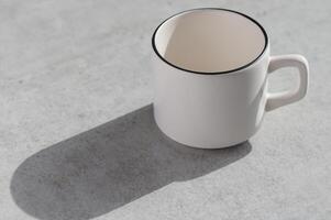 empty coffee cup on stone background photo