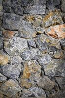 old wall of stone shell rock of arbitrary shape. isolated image 1 photo