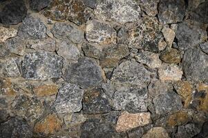 A wall constructed from genuine rock materials 1 photo