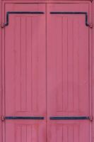 Full frame shot of light red painted old wood abstract background photo